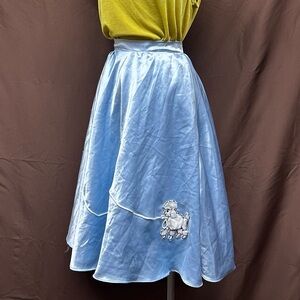 Blue satin midi skirt with felted poodle